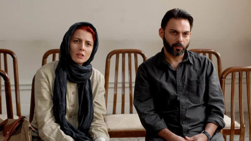Leila Hatami as Simin and Peyman Moadi as Nader engage in a heated argument about leaving in the courtroom, in the opening scene of the movie "Jodaeiye Nader az Simin."