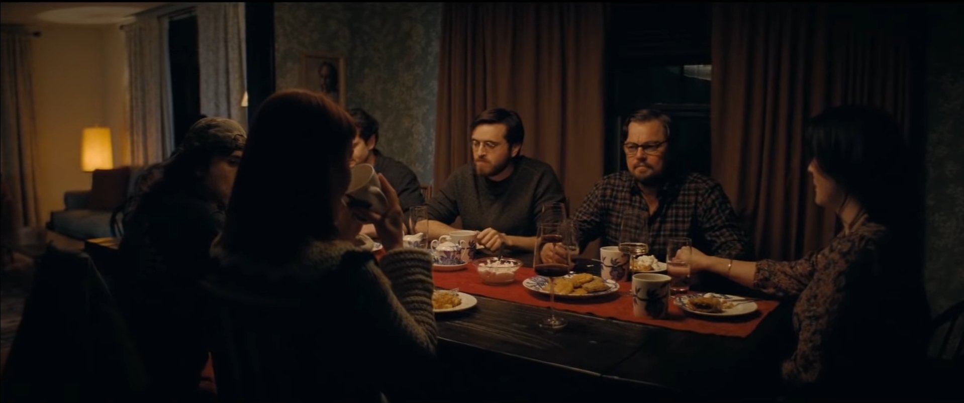 Final scene from the movie Don't Look Up, featuring characters restlessly eating dinner.