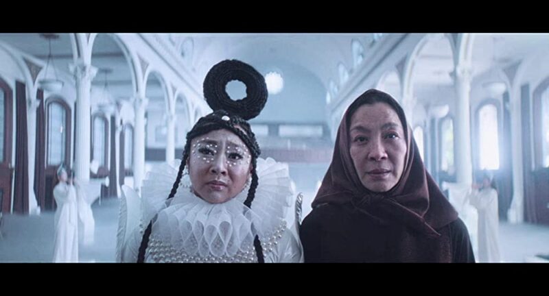 Evelyn Wang (Michelle Yeoh) and Joy Wang (Stephanie Hsu) from 'Everything Everywhere All at Once' joyfully visit the charming Everything Bagel.
