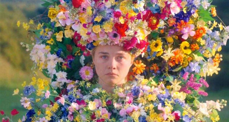 Dani in Midsommar, wearing a flower crown and dress.