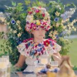 15 Details That Must Be Known About Midsommar! Dani in Midsommar, wearing a flower crown and dress.