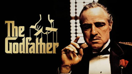 Iconic cover photo featuring Marlon Brando as Don Vito Corleone from The Godfather movie, looking thoughtfully with his index finger up. The cover includes "The Godfather" article.