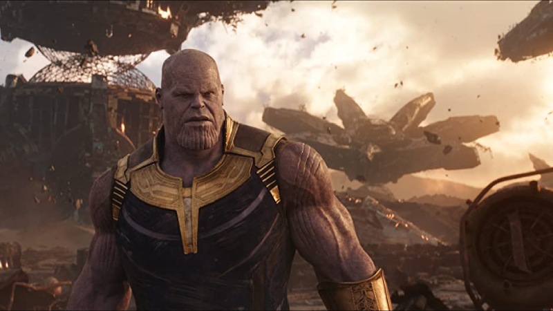 Thanos, the formidable antagonist of Avengers: Infinity War, walks with a majestic presence, emanating power and determination.