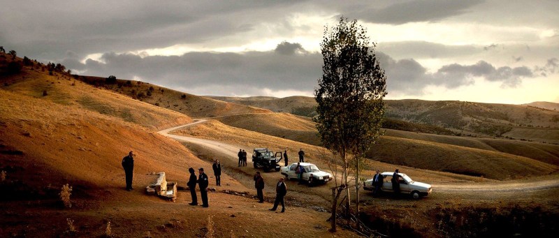 A panoramic view of a rural landscape with mountains in the background, from the movie Once Upon a Time in Anatolia.