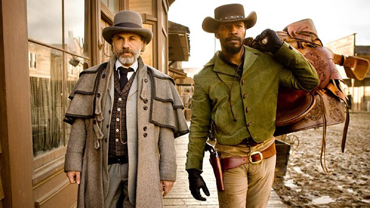 Django (Jamie Foxx) and Dr. King Schultz (Christoph Waltz) walking together in Django Unchained.