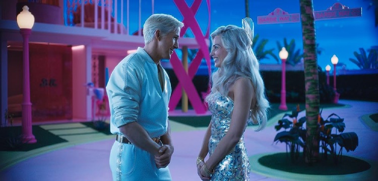Margot Robbie as Barbie and Ryan Gosling as Ken sharing a tender gaze of affection in a scene from the movie Barbie.
