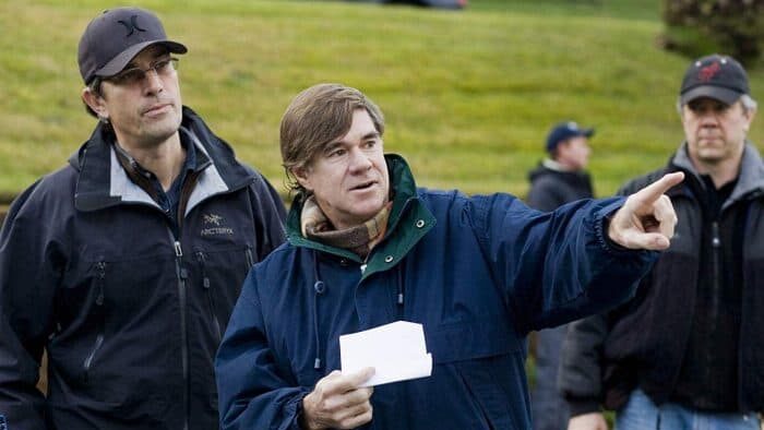 Gus Van Sant gestures with his index finger, conveying a message while on the set of the movie 'Milk.'