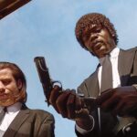 How Did Pulp Fiction Change the Crime Genre? Low-angle view of the characters Vincent Vega (played by John Travolta) and Jules Winnfield (played by Samuel L. Jackson) from the movie "Pulp Fiction" as they inspect the car's trunk.