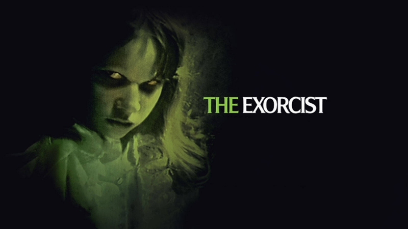 Movie poster for 'The Exorcist' featuring a terrifying girl in a dark setting.