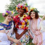 Dress to Impress: Midsommar Costume Secrets That Will Blow Your Mind! Three women in elaborate Midsommar group costumes at the "Buffalo Exchange New Orleans" event.