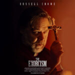 Russell Crowe Returns to Horror Cinema with Controversial "The Exorcism" Impressive wallpaper of The Exorcism movie featuring Russell Crowe seeking refuge in God with a cross in his hand.