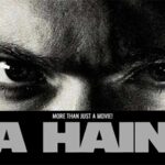 Why La Haine Is More Than Just a Movie: It's a Cultural Phenomenon! Poster featuring the angry eyes of Vinz (Vincent Cassel) from the movie 'La Haine'. Text reads 'la haine more than just movie'.